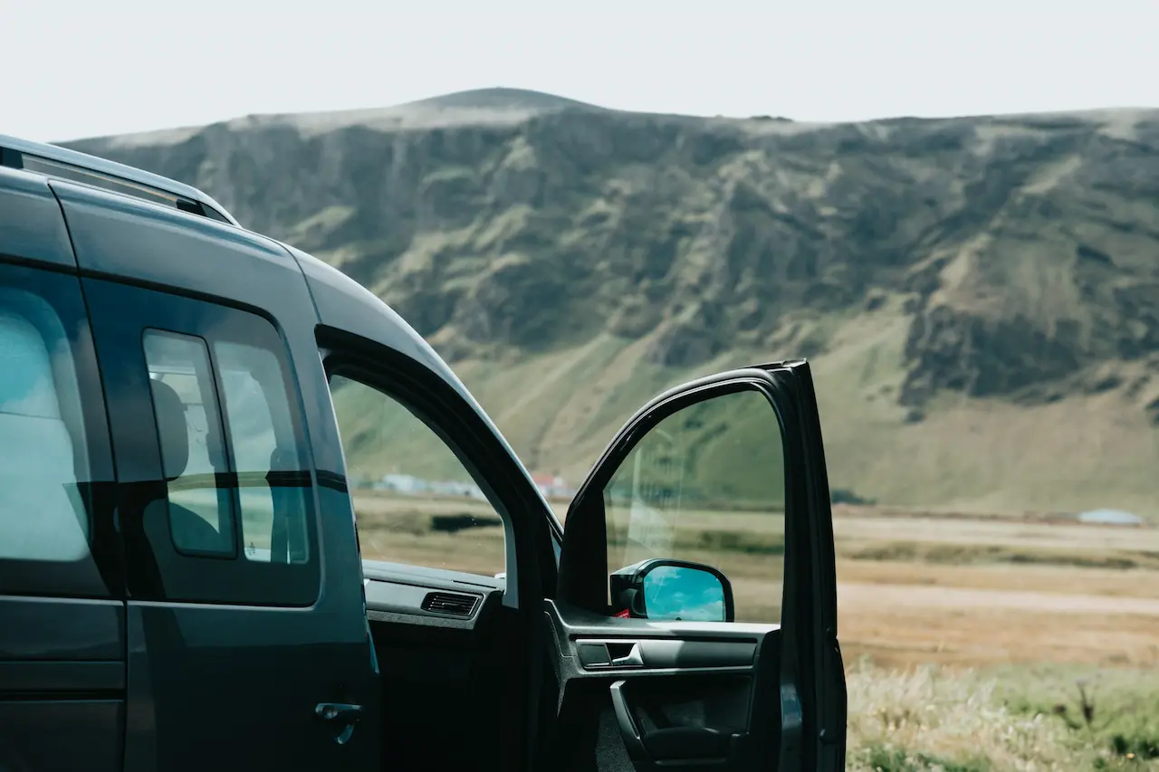 Car Looking Over Mountains