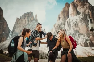 Four friends on holidays laughing